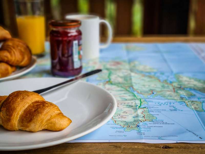 continental breakfast with a map of Skye 
on the table
