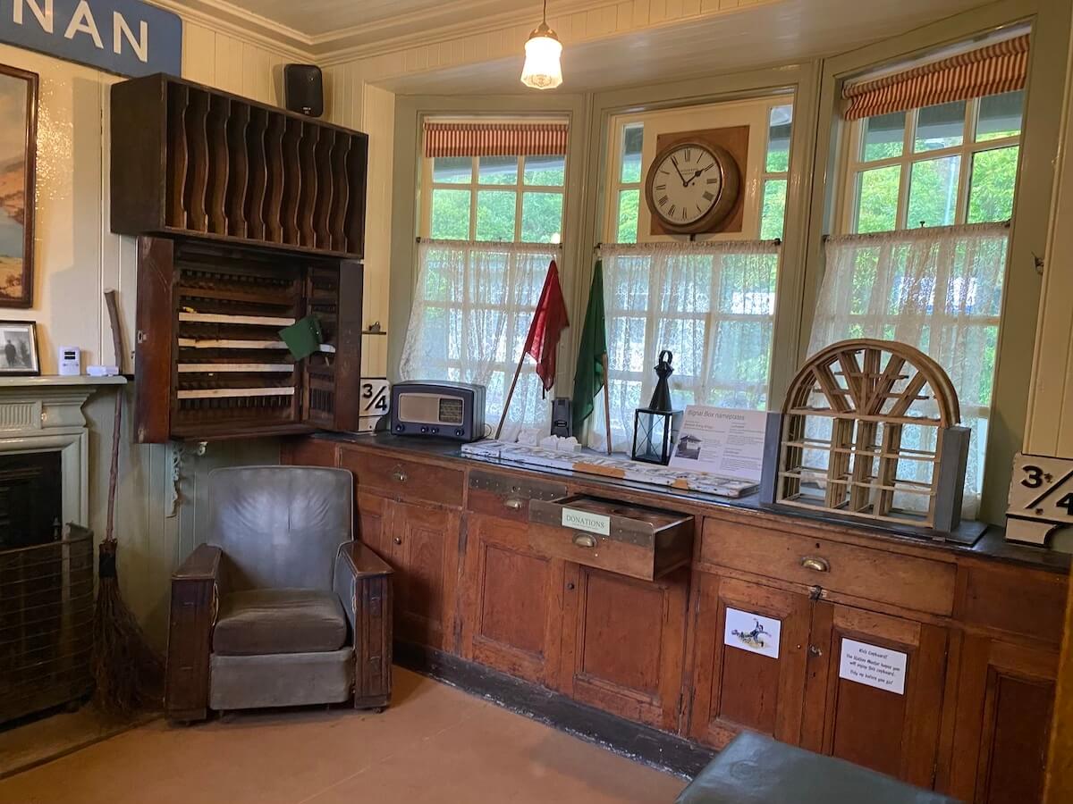 room inside old station displaying old stationmaster's equipment Glenfinnan Station Museum